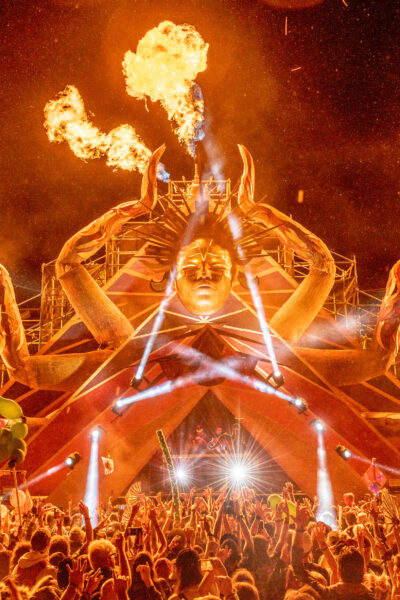 Elements Festival 2022 Elements Festival fire hands art display crowd statue stage lights